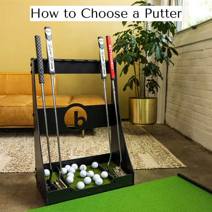 selection of putters on a putter rack next to a BirdieBall indoor putting mat