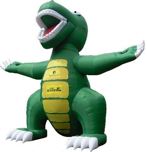 The BirdieBall BirdieRex, a large green inflatable golf target with yellow belly panels and outstretched arms plus branded logos on its chest, stands against a white background—perfect as an eye-catching centerpiece for your game.